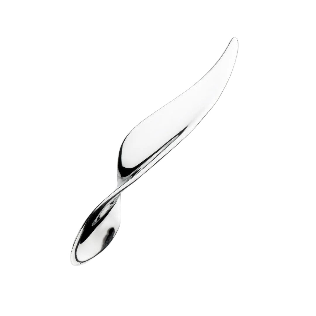 A polished silver-toned sculptural pendant or charm with a flowing, abstract leaf-like form, shown on a light gray background.
