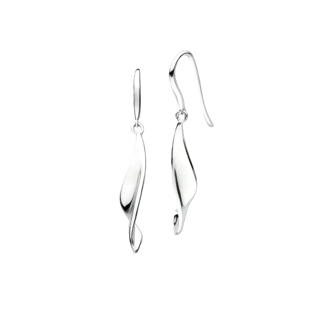 A pair of polished silver drop earrings with a curved, organic leaf-like silhouette, shown against a solid light gray background.