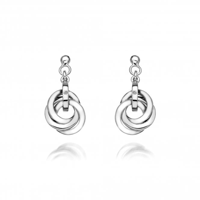 Pair of silver earrings with interlocking rings on a white background