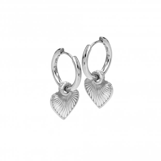 Pair of silver hoop earrings with heart-shaped charms on a white background