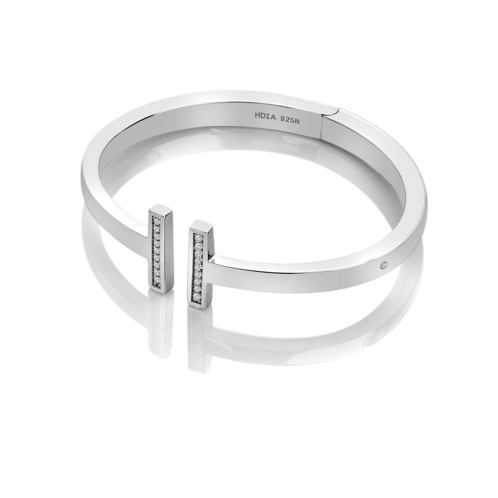 Silver bracelet with a diamond accent on a white background