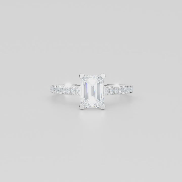 0.25ct D VS2 Emerald Cut Diamond Shoulder Ring in Platinum